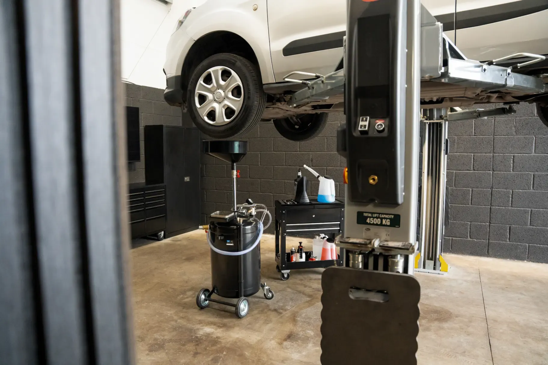 Vehicle on a two-post lift